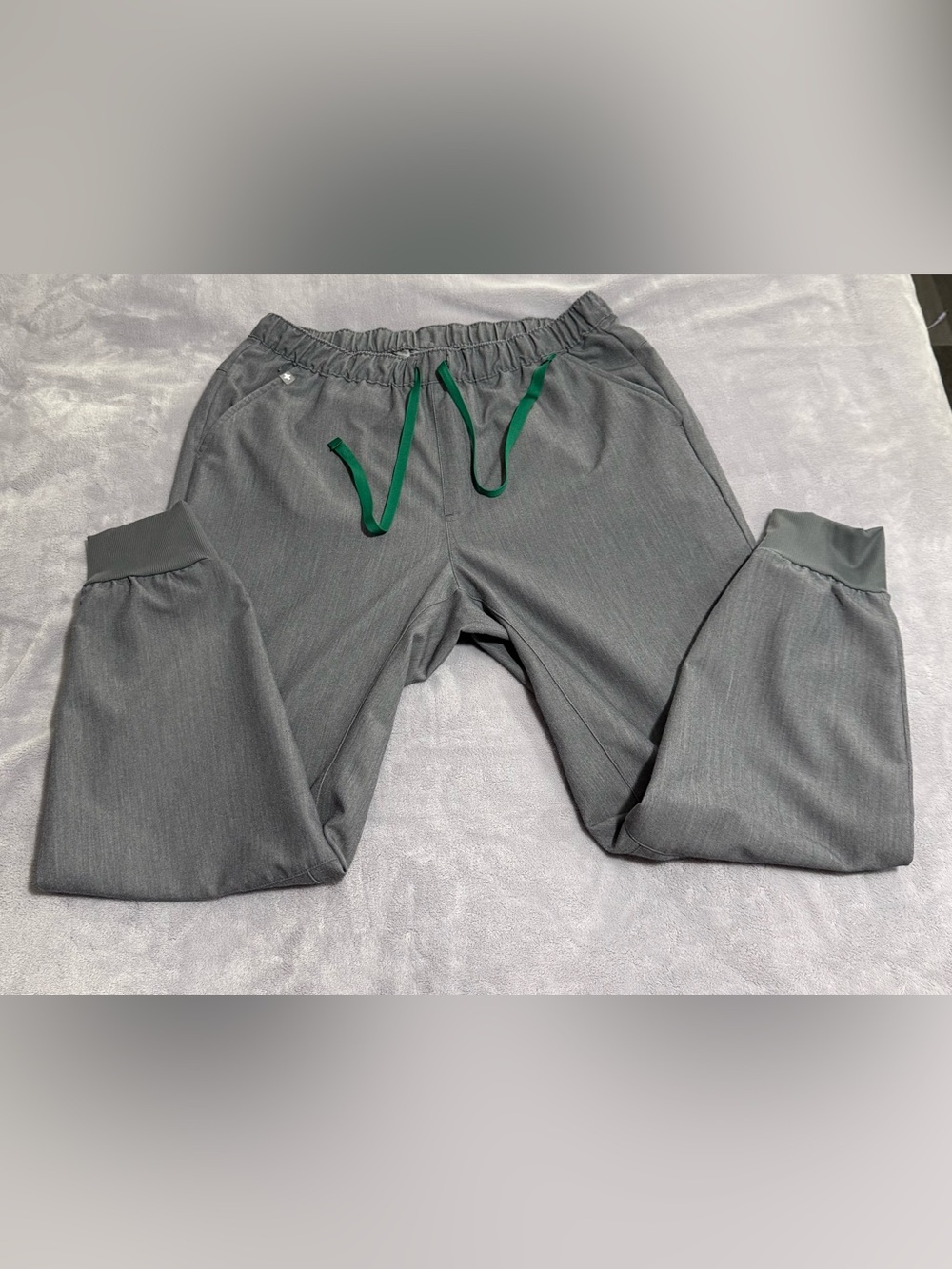 FIGS Technical Collection Jogger Scrub Pants Grey Heathered With Green Drawing.